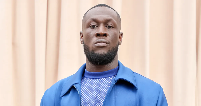 Stormzy in casual shirt and jacket