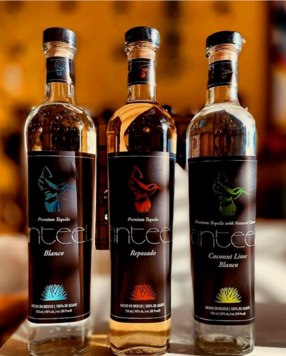 Anteel tequila, in bottles with dark colored labels