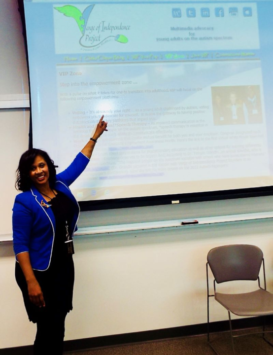 Eva Blackwell iintroducing the Verge of Independence Project on a screen projector at a lecture hall