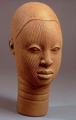 sculpture of head of a woman, terra cotta. Nigerian artifact