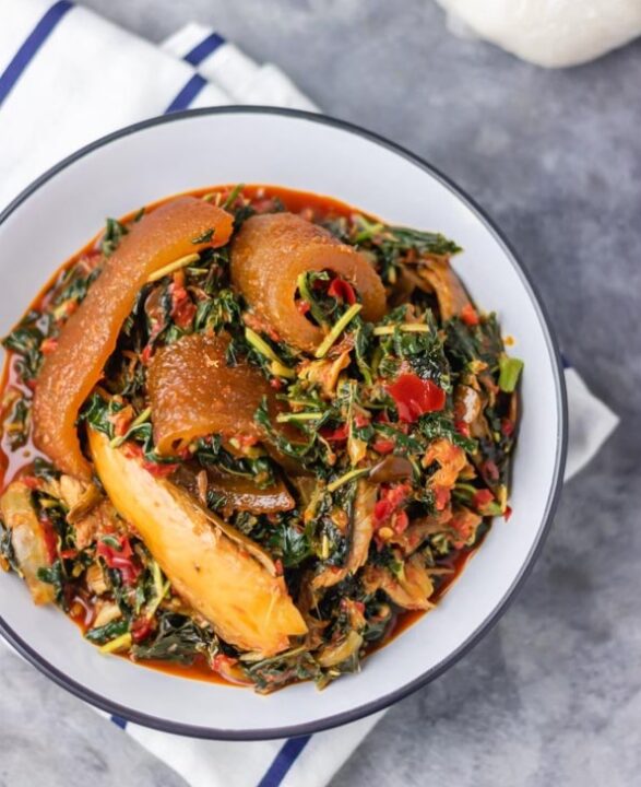 Efo riro, a red soup with greens, fish, and peppers