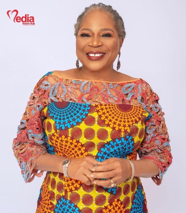 Onyela Onwenu in a traditional patterned dress at formal event