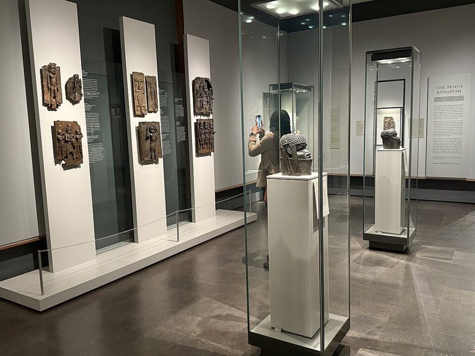 African bronze reliefs on display in museum gallery