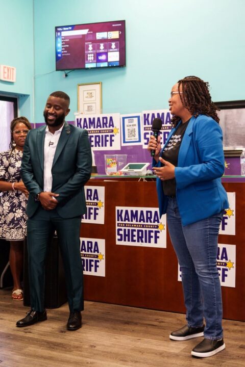 Siddiq Kamara being introduced before a speech