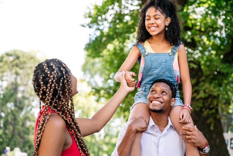 African American family spending time outdoors