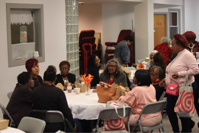 photo of Black professional women having discussion at the She Shines Conference