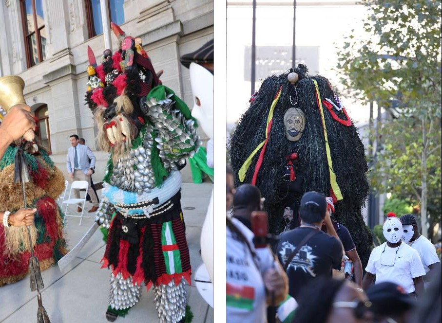 Nigerian traditional masquerade dancers performing for the event