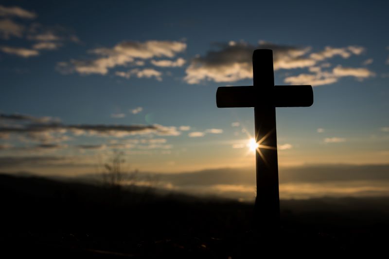 silhouette-catholic-cross-sunrise