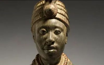 Olokun bronze head, a sculpture of a distinguished man in a headdress and necklaces