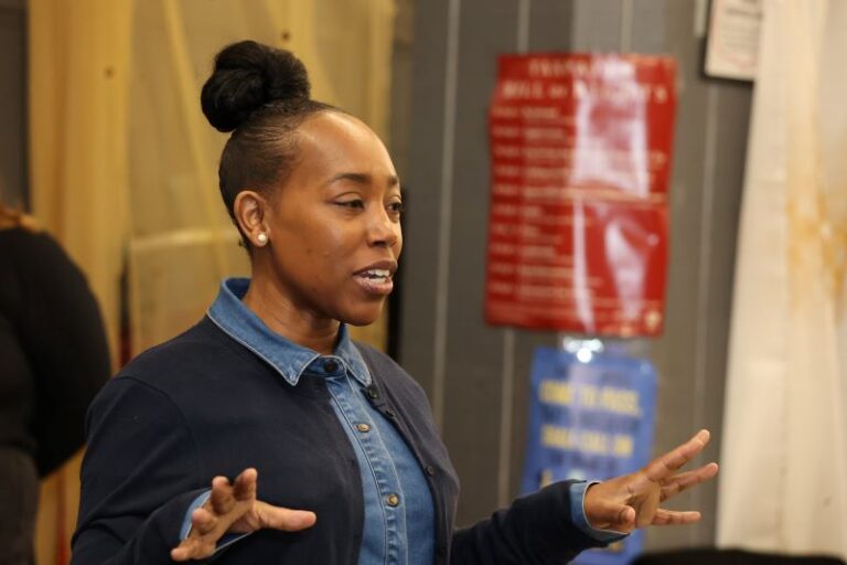 Dr. Nikia Owens, president and CEO of Campaign for Working Families, giving a talk at event