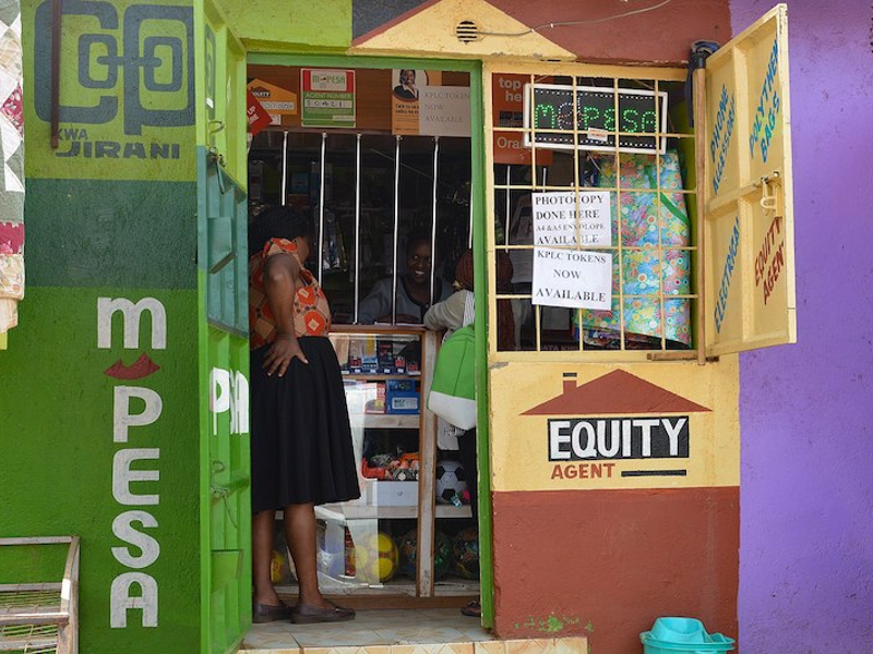 a shop in Kenya with M-Pesa sign outside