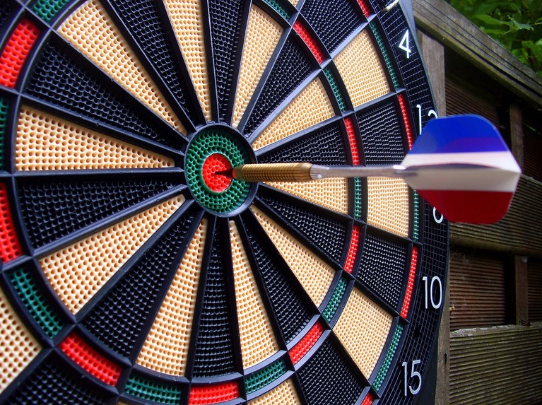 a dart thrown at the middle of target