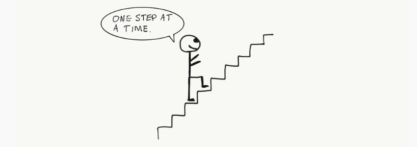 a stick figure climbing stairs with speech bubble saying "One Step At a Time"