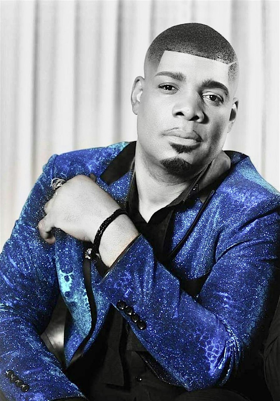 Chris Murray in sparkling suit