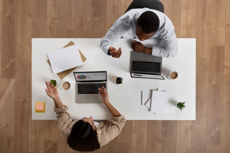 top-view-people-working-together-office