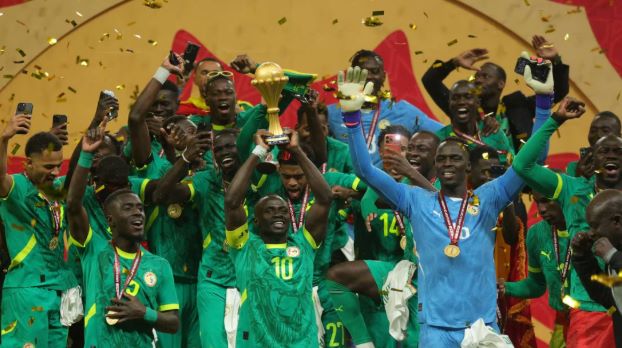 Senegalese football team at AFCON celebrating