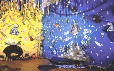 art installation taking up entire room with metallic foil details