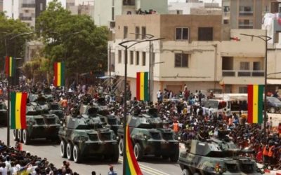 tanks in the street with Senegal flags, on Senegal Independence Day