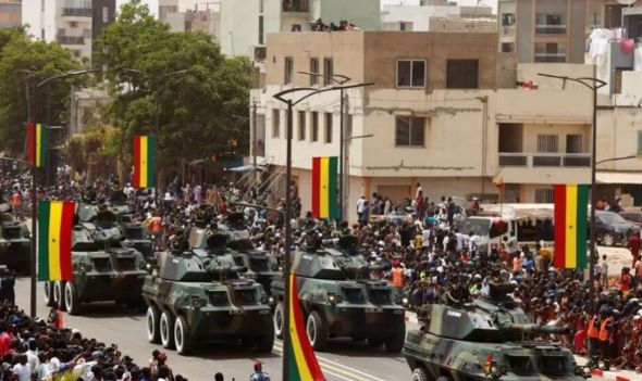 tanks in the street with Senegal flags, on Senegal Independence Day