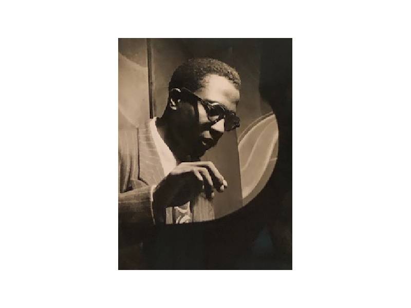 photograph of Thelonious Monk playing piano