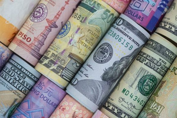 rolled paper currencies of various countries