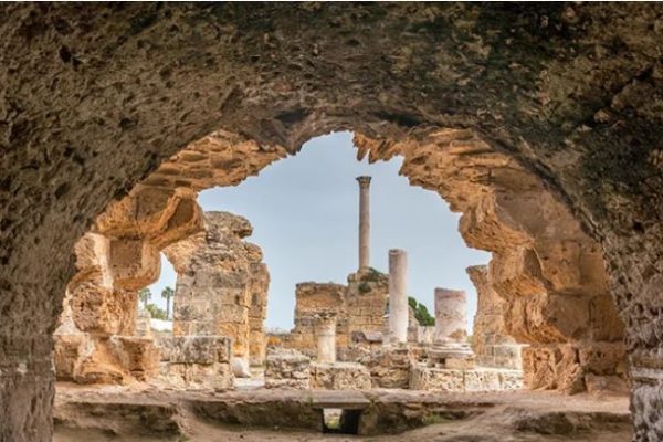 ancient ruins of Carthage, with partial columns and arches