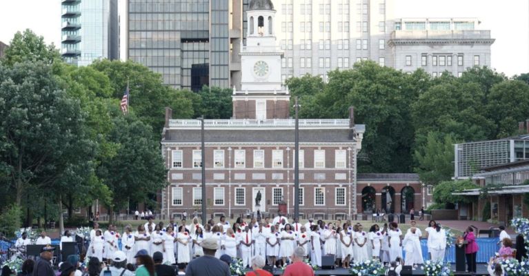 gospel choir performing in front of Independence Hall in Philadelphia