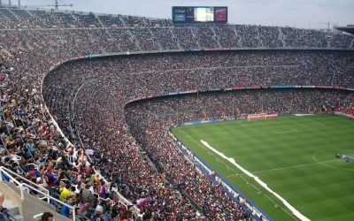 a packed football stadium with World Cup spectators