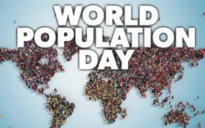 the letters "World Population Day" with a background of the world map created with miniature people