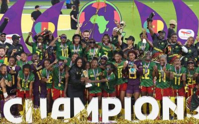 Cameroon women's team wearing medals and celebrating their championship